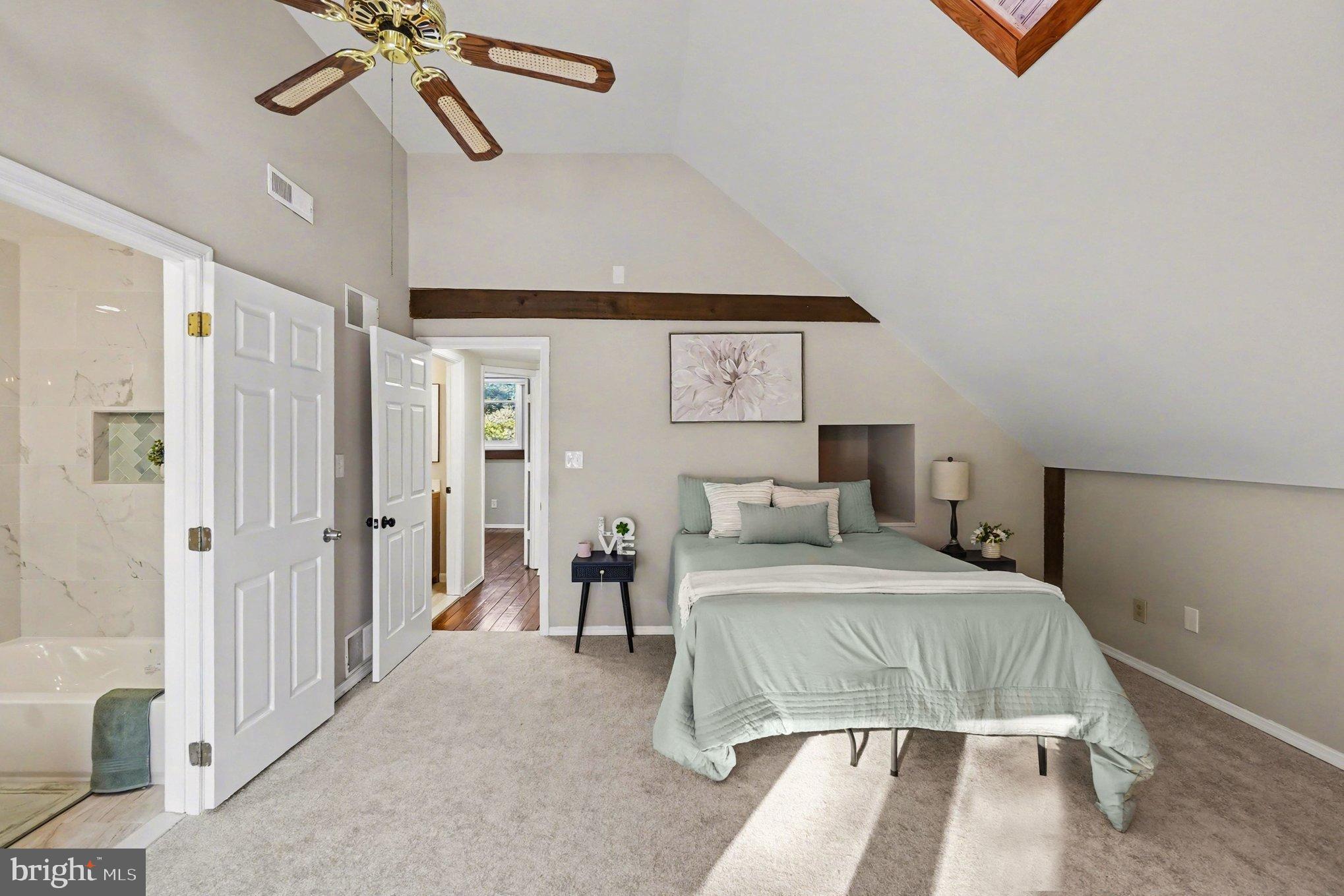 151 Fawn Drive Elkton, MD 21921 - Photo 17 of 26 a bedroom with a bed and a chandelier