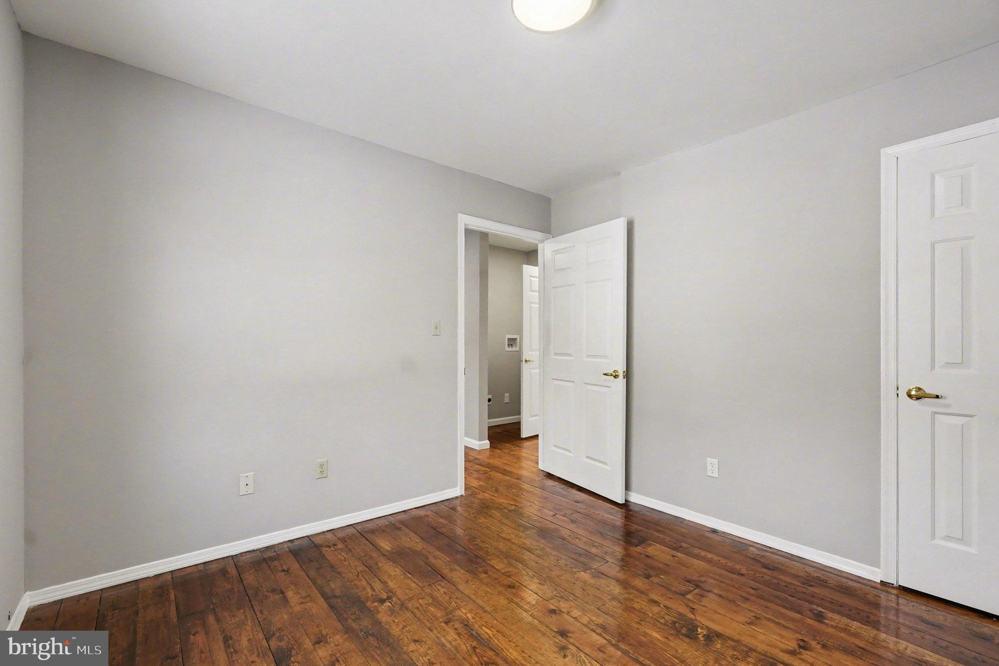 151 Fawn Drive Elkton, MD 21921 - Photo 19 of 26 a view of an empty room with wooden floor and closet