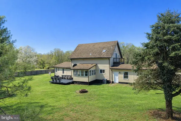 a aerial view of a house with a big yard