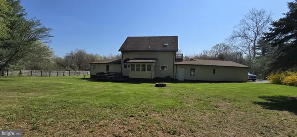 a house view with a garden space
