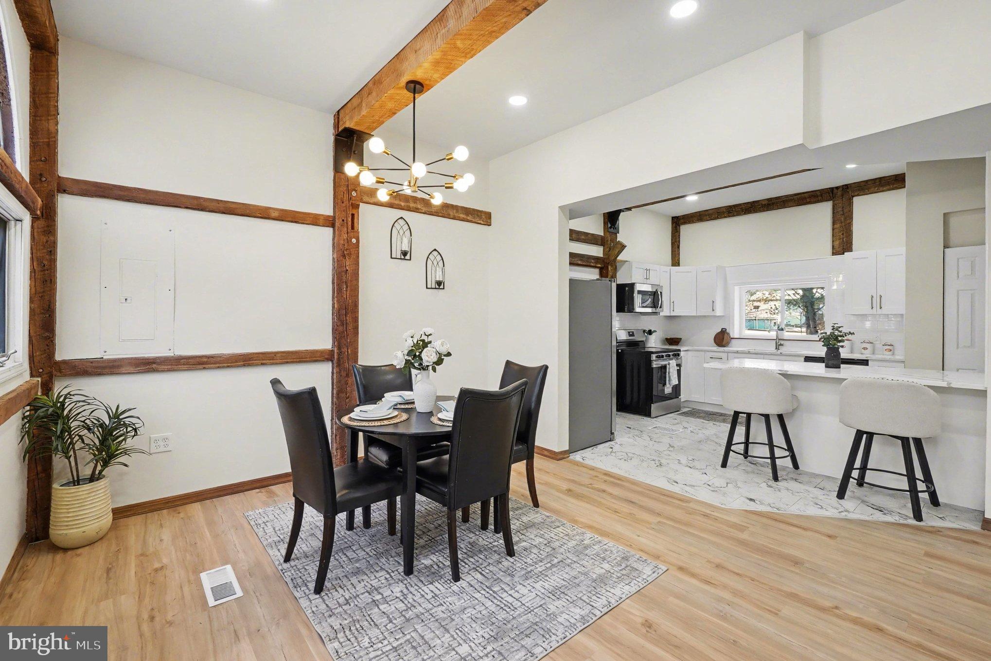 151 Fawn Drive Elkton, MD 21921 - Photo 10 of 26 a view of a dining room with furniture and wooden floor