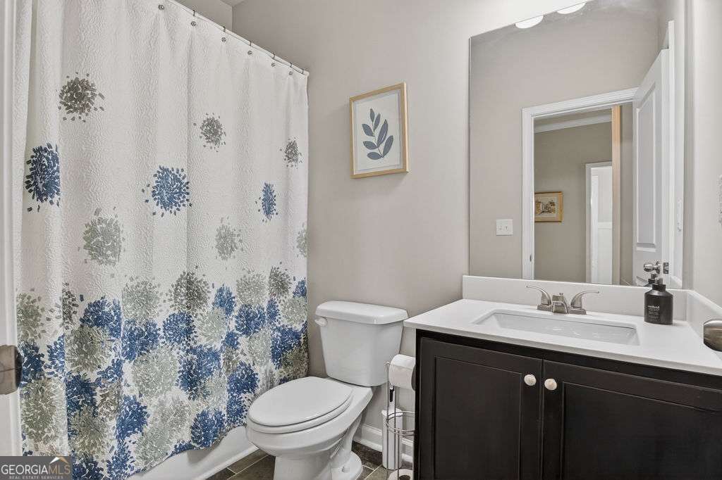 280 Greystone Court Winder, GA 30680 - Photo 12 of 40 a bathroom with a sink and toilet