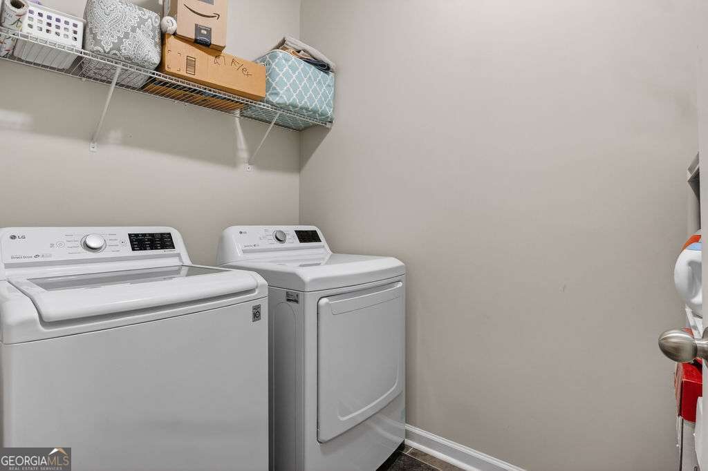 280 Greystone Court Winder, GA 30680 - Photo 34 of 40 a utility room with dryer and washer