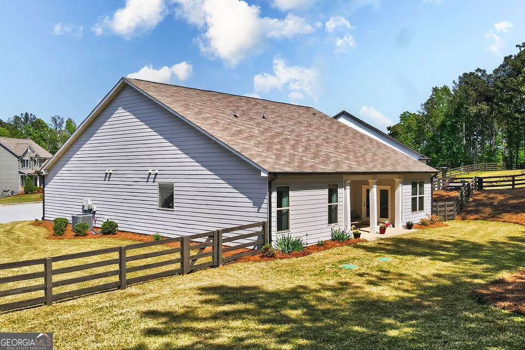 280 Greystone Court Winder, GA 30680 - Photo 35 of 40 a front view of a house with a patio