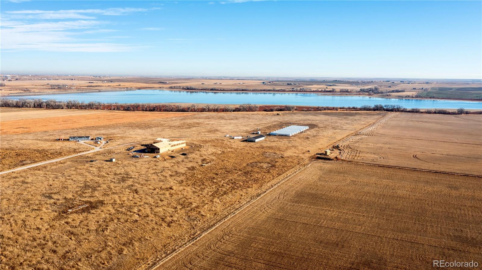 16590 Watkins Road Hudson, CO 80642 - Photo 15 of 30 a view of an ocean and beach