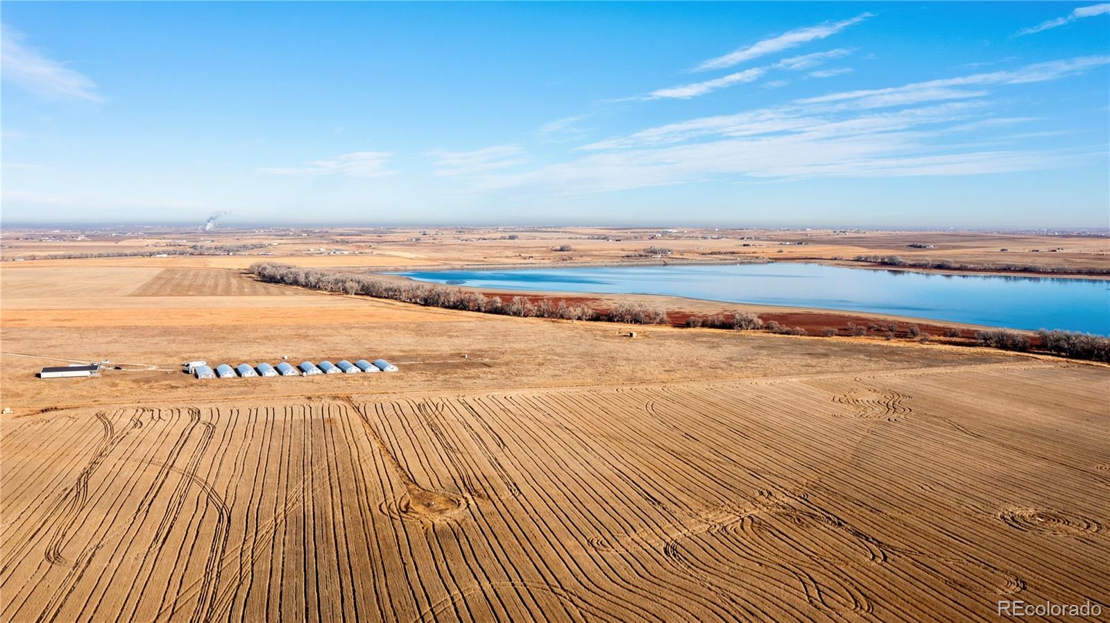 16590 Watkins Road Hudson, CO 80642 - Photo 19 of 30 a view of an ocean beach