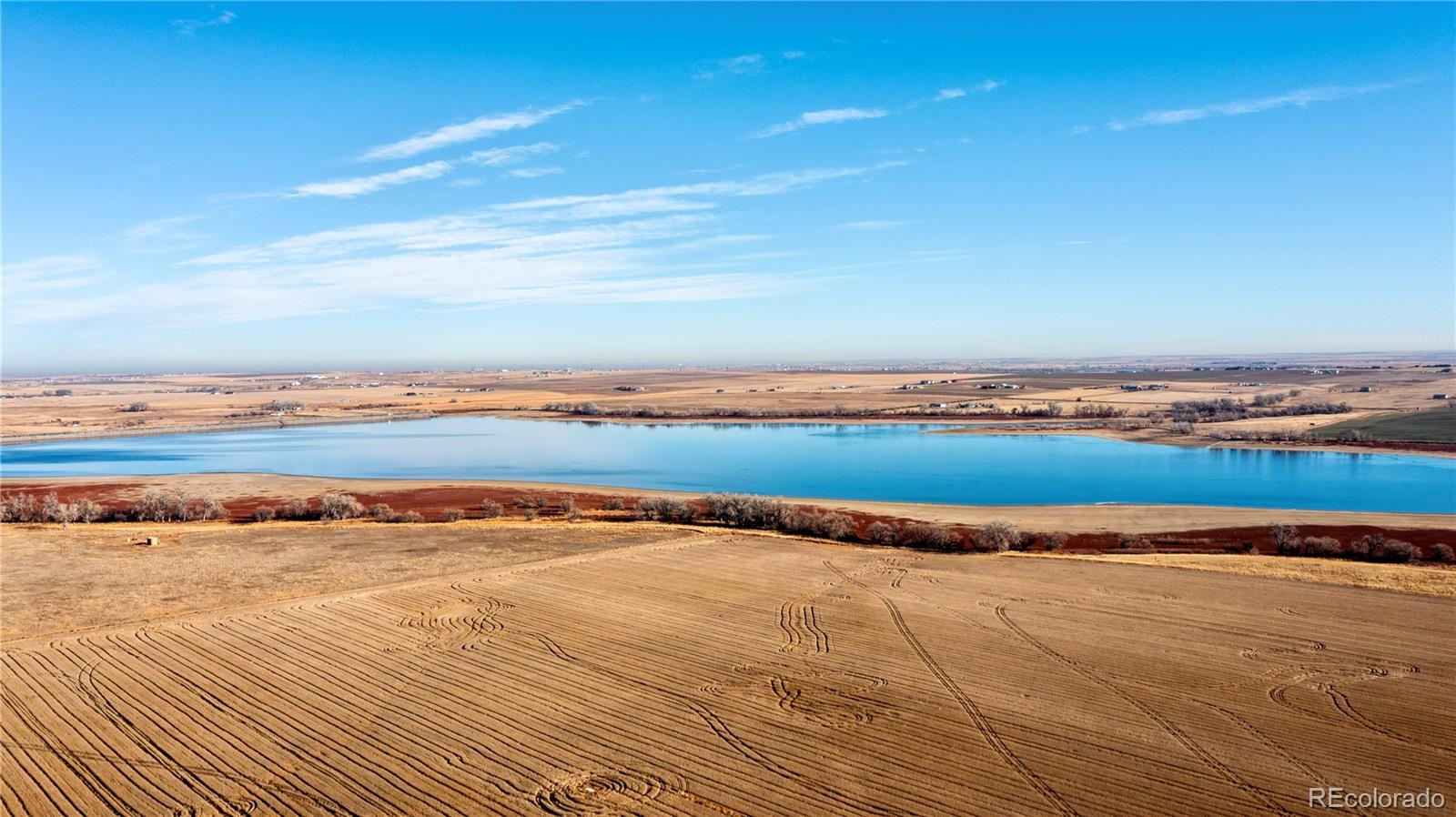 16590 Watkins Road Hudson, CO 80642 - Photo 20 of 30 a view of an ocean and beach