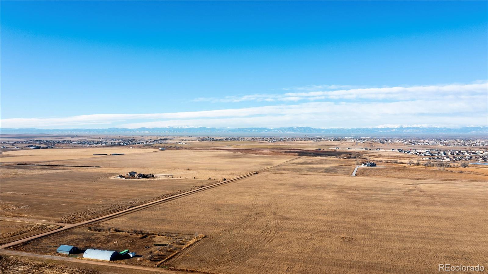 16590 Watkins Road Hudson, CO 80642 - Photo 21 of 30 a view of an ocean and beach
