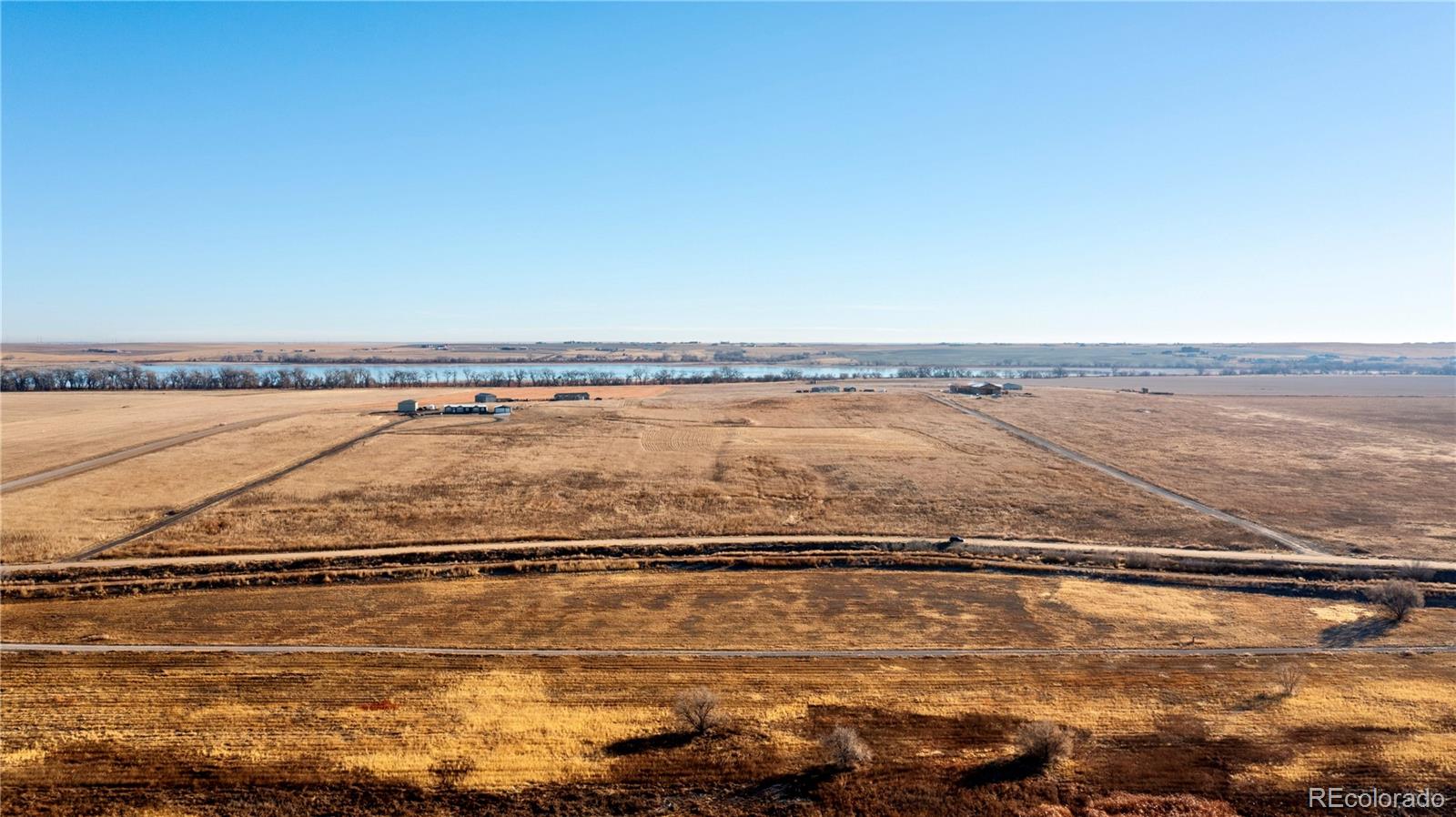 16590 Watkins Road Hudson, CO 80642 - Photo 3 of 30 a view of an ocean