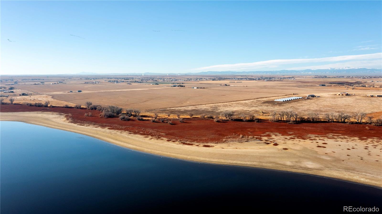 16590 Watkins Road Hudson, CO 80642 - Photo 7 of 30 a view of an ocean