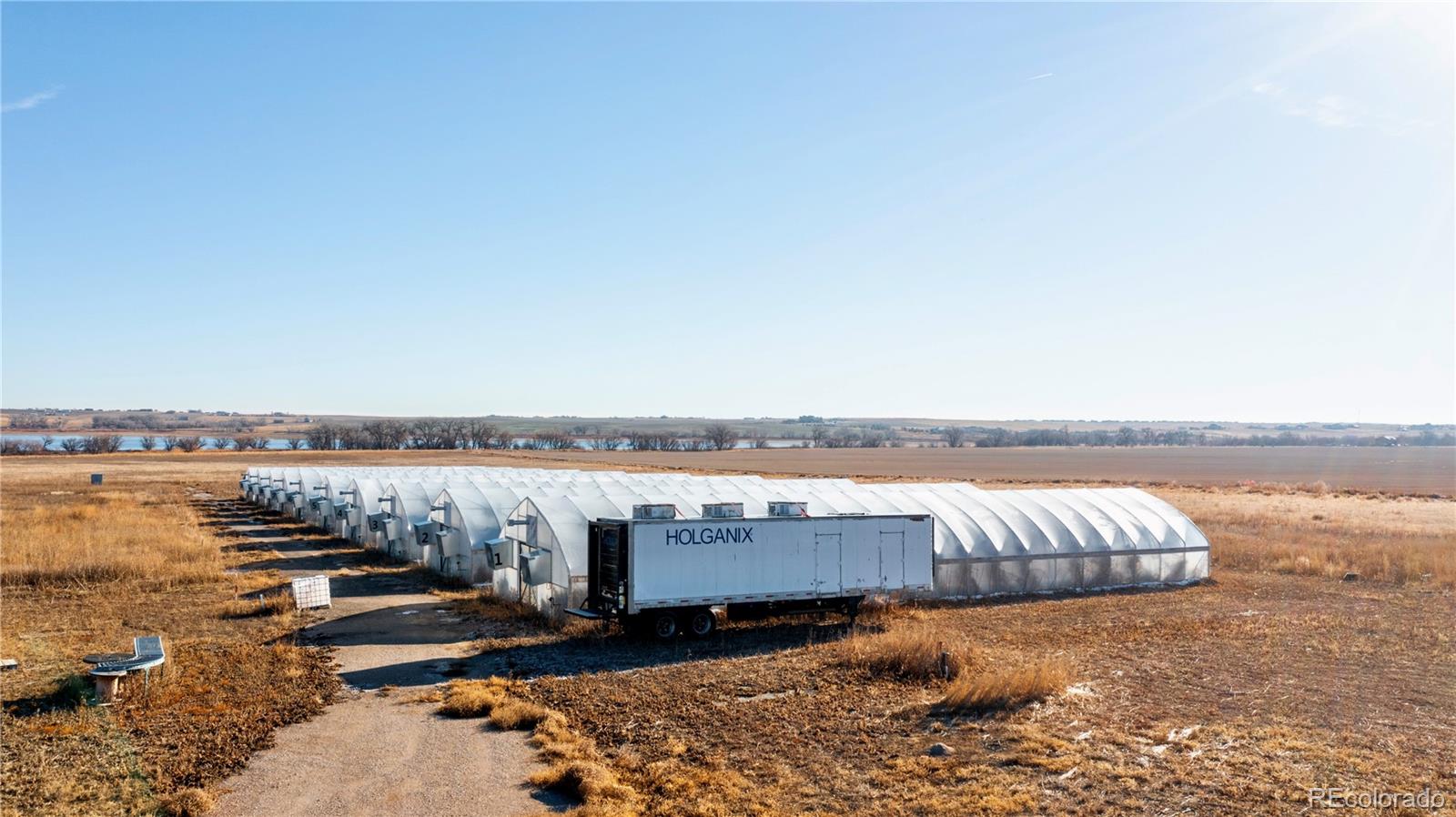 16590 Watkins Road Hudson, CO 80642 - Photo 9 of 30 an aerial view of a ocean