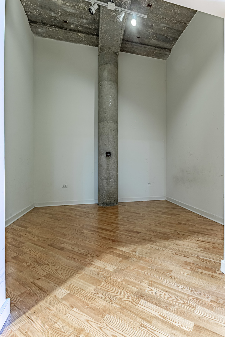 3963 West Belmont Avenue, Unit 117 Chicago, IL 60618 - Photo 6 of 13 a view of empty room
