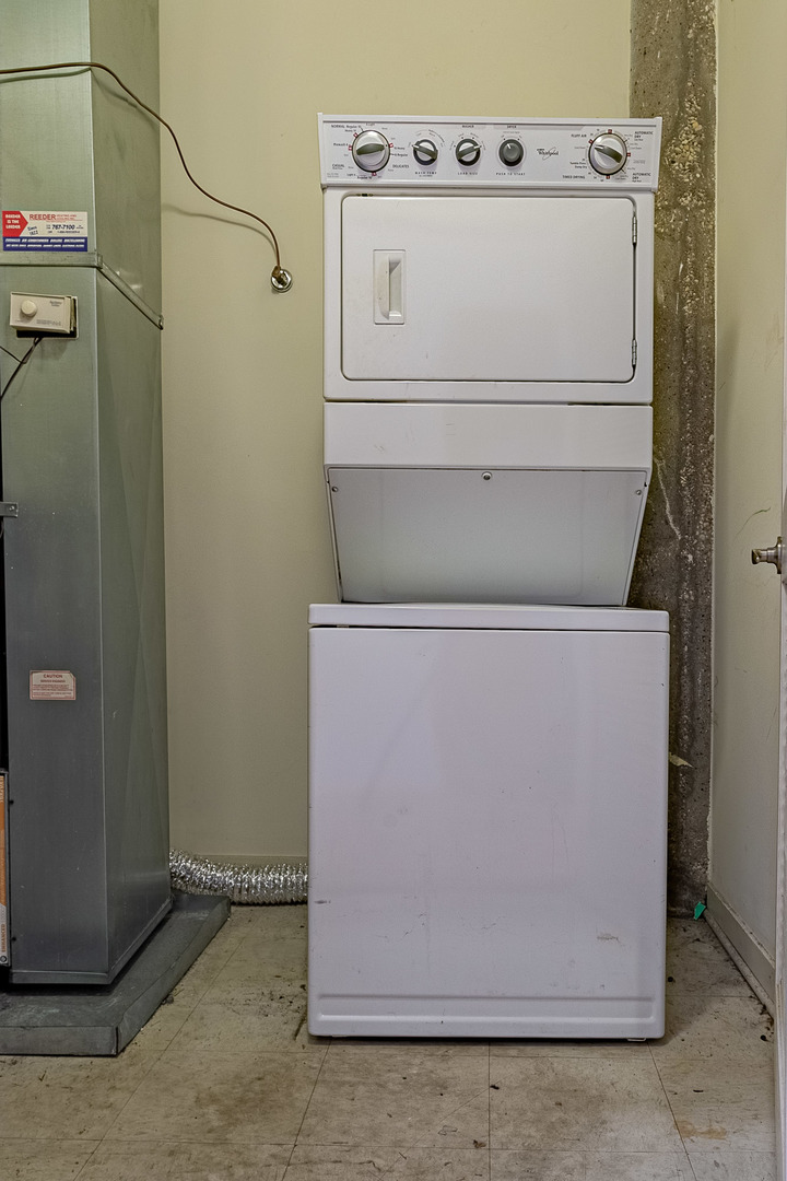 3963 West Belmont Avenue, Unit 117 Chicago, IL 60618 - Photo 10 of 13 a utility room with dryer and washer