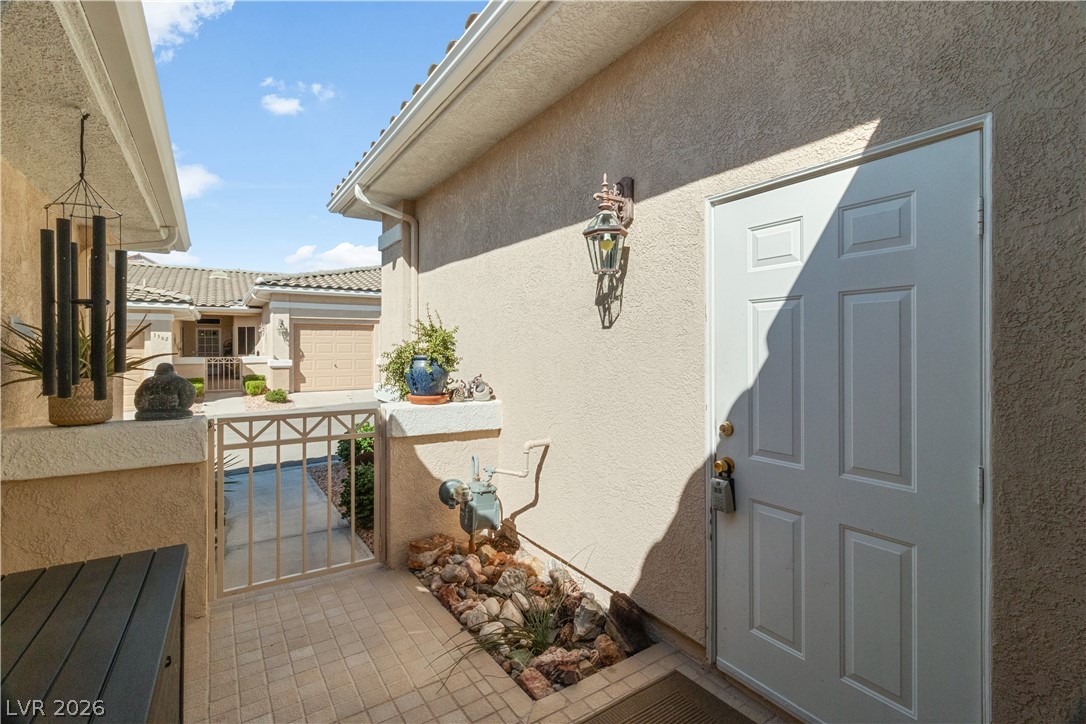 3374 Pheasant Canyon Way Laughlin, NV 89029 - Photo 74 of 92 2nd garage entry from front courtyard