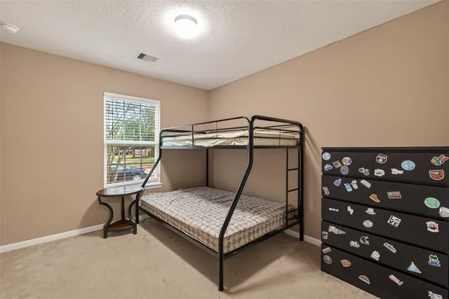 a view of a livingroom with furniture and window