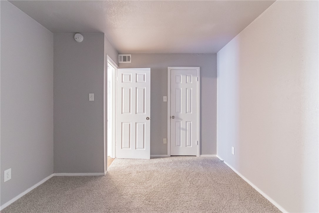 3627 Menchaca Road, Unit 112 Austin, TX 78704 - Photo 16 of 25 Bedroom. The closed closet door is in the background.
