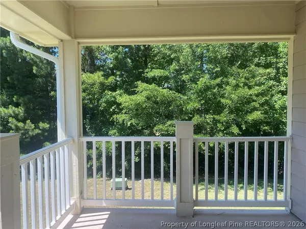 a view of backyard with green space