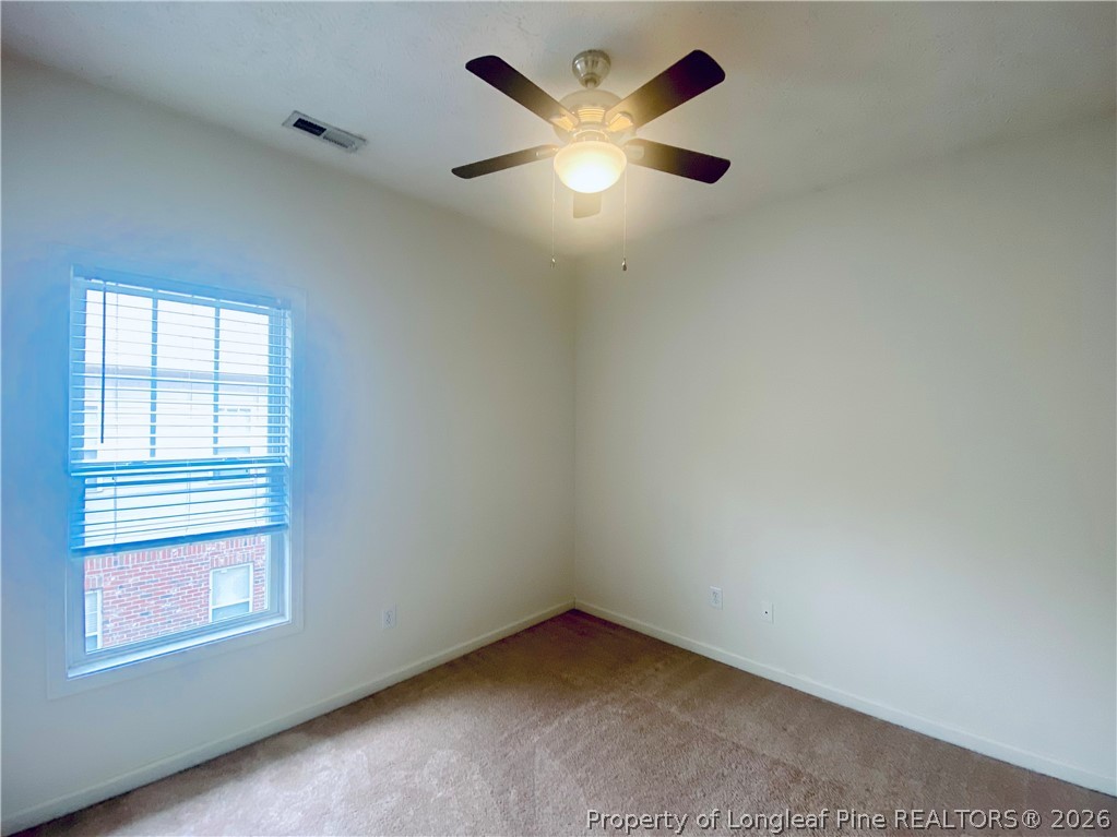 516 Lionshead Road, Unit 6 Fayetteville, NC 28311 - Photo 19 of 27 an empty room with a window