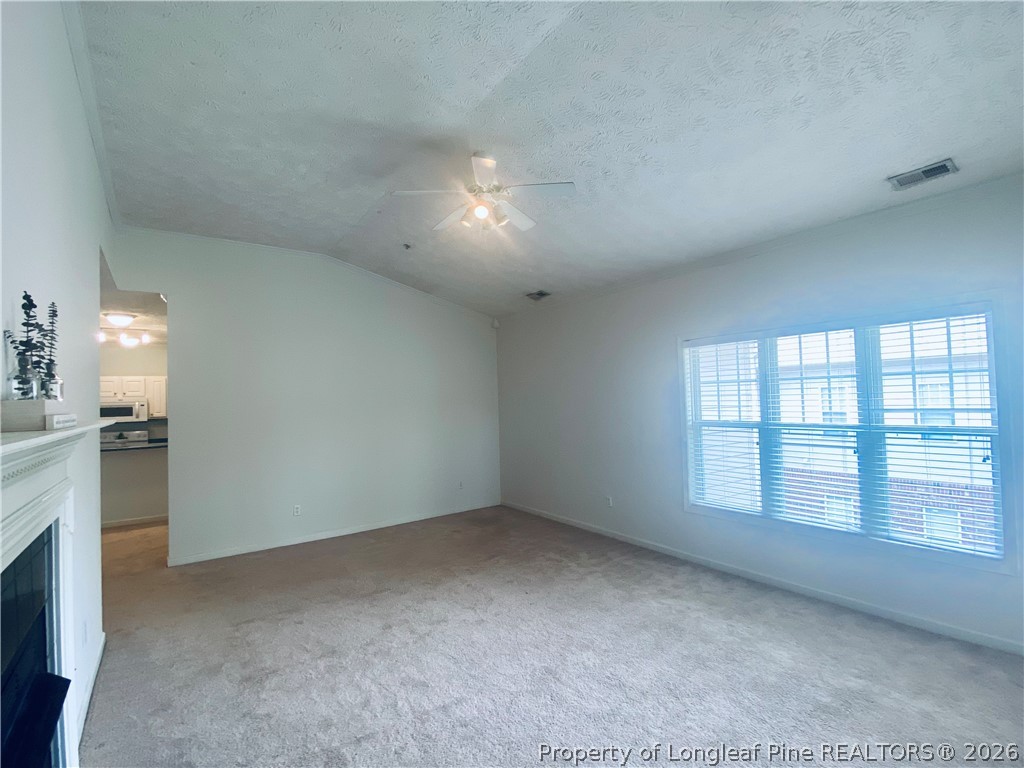 516 Lionshead Road, Unit 6 Fayetteville, NC 28311 - Photo 6 of 27 an empty room with a empty space and windows