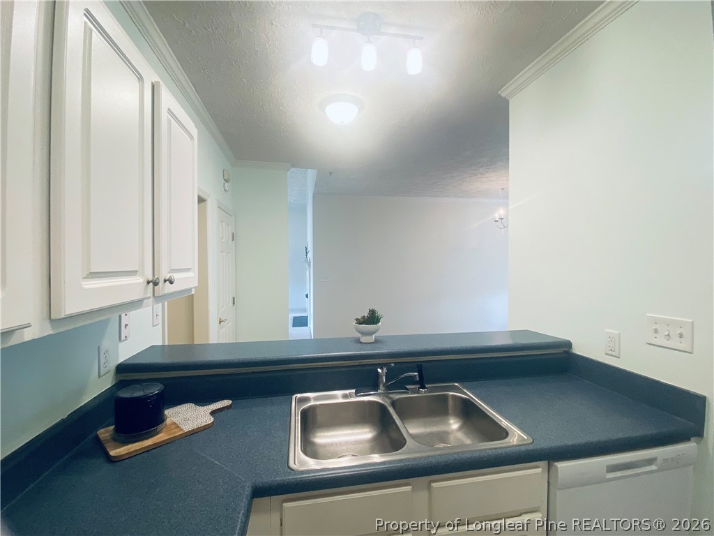 516 Lionshead Road, Unit 6 Fayetteville, NC 28311 - Photo 9 of 27 a bathroom with a sink and a mirror