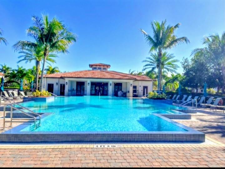 17548 Southwest 153rd Court Miami, FL 33187 - Photo 18 of 21 a front view of a house with garden