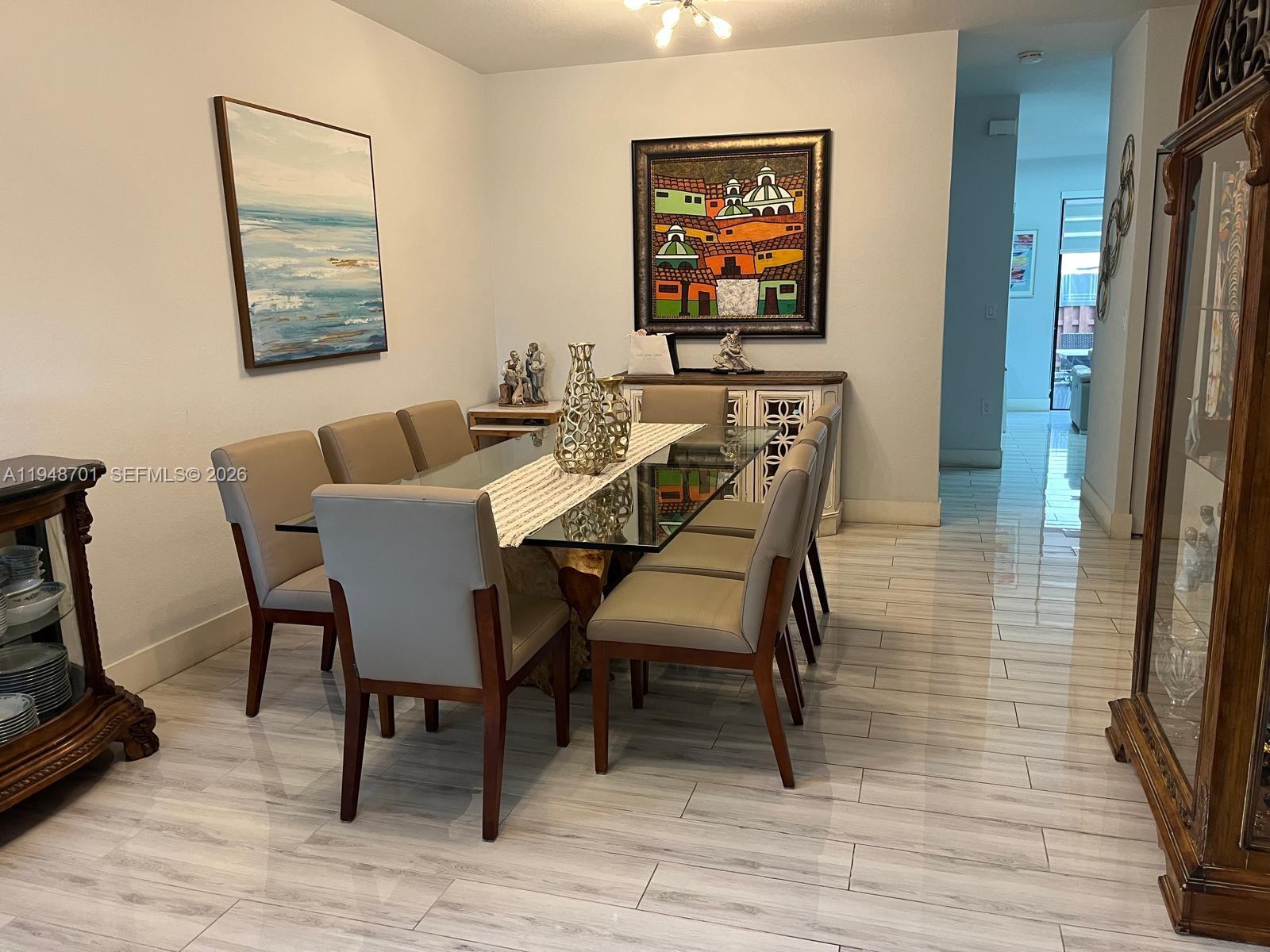 17548 Southwest 153rd Court Miami, FL 33187 - Photo 3 of 21 a view of a dining room with furniture