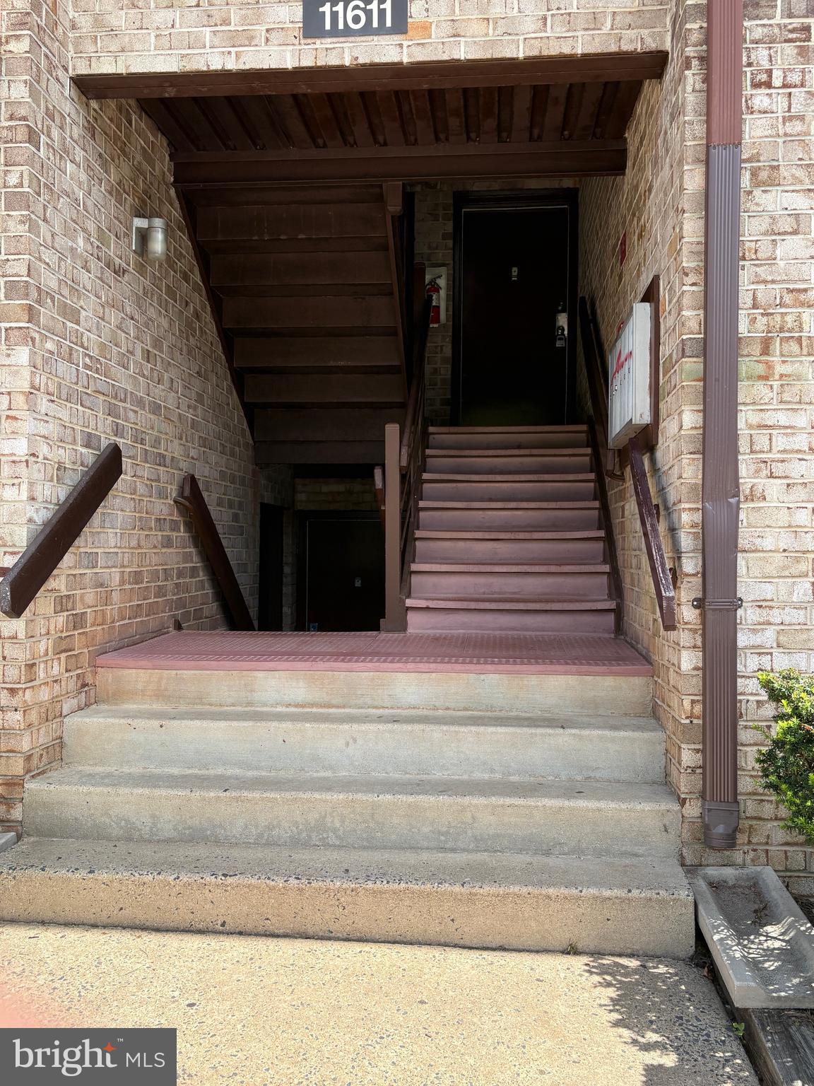 11611 Stoneview Square, Unit 70/12C Reston, VA 20191 - Photo 12 of 12 a view of a entryway door of the house