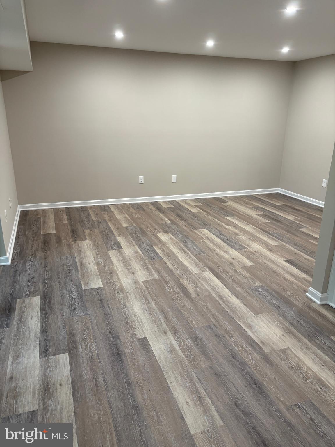 11611 Stoneview Square, Unit 70/12C Reston, VA 20191 - Photo 6 of 12 a view of room with wooden floor