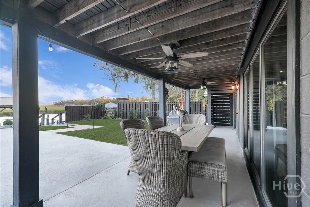 715 East 1st Street Midway, GA 31320 - Photo 32 of 42 Ground Floor Patio-Opens to Flex Rm