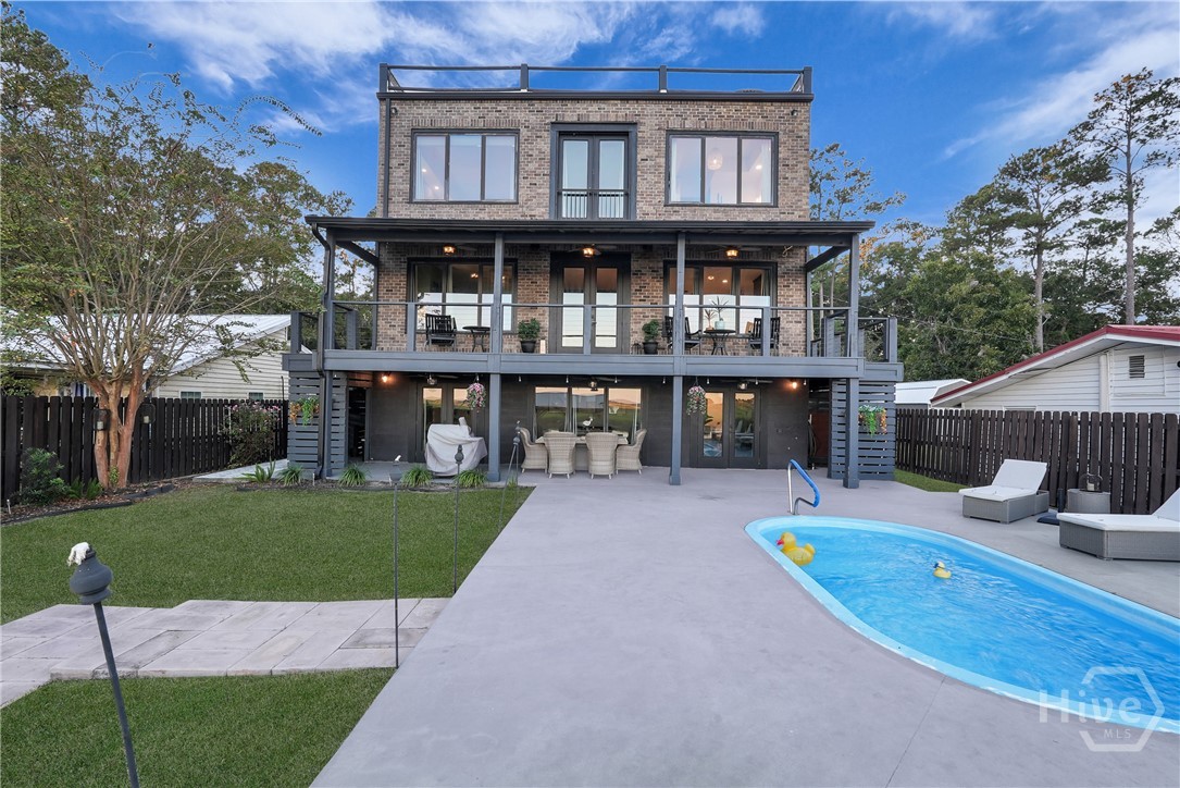 715 East 1st Street Midway, GA 31320 - Photo 35 of 42 Rear View of Home