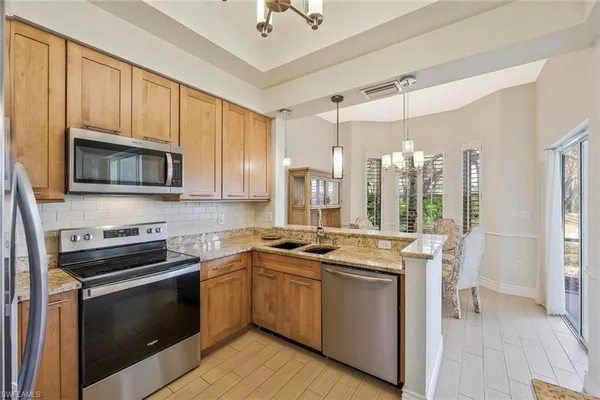 $599,000 | 24640 Ivory Cane Drive, Unit 101, Bonita Springs, FL 34134