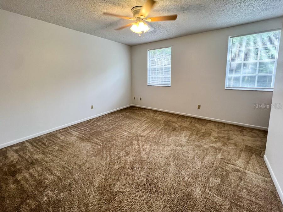 5601 Ave H, Unit 3 McIntosh, FL 32664 - Photo 17 of 21 a view of an empty room with a window