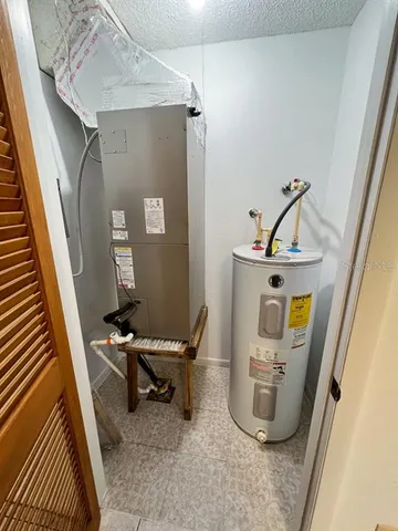 a view of storage and utility room