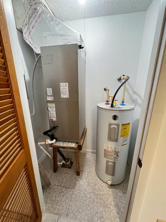 5601 Ave H, Unit 3 McIntosh, FL 32664 - Photo 9 of 21 a view of storage and utility room