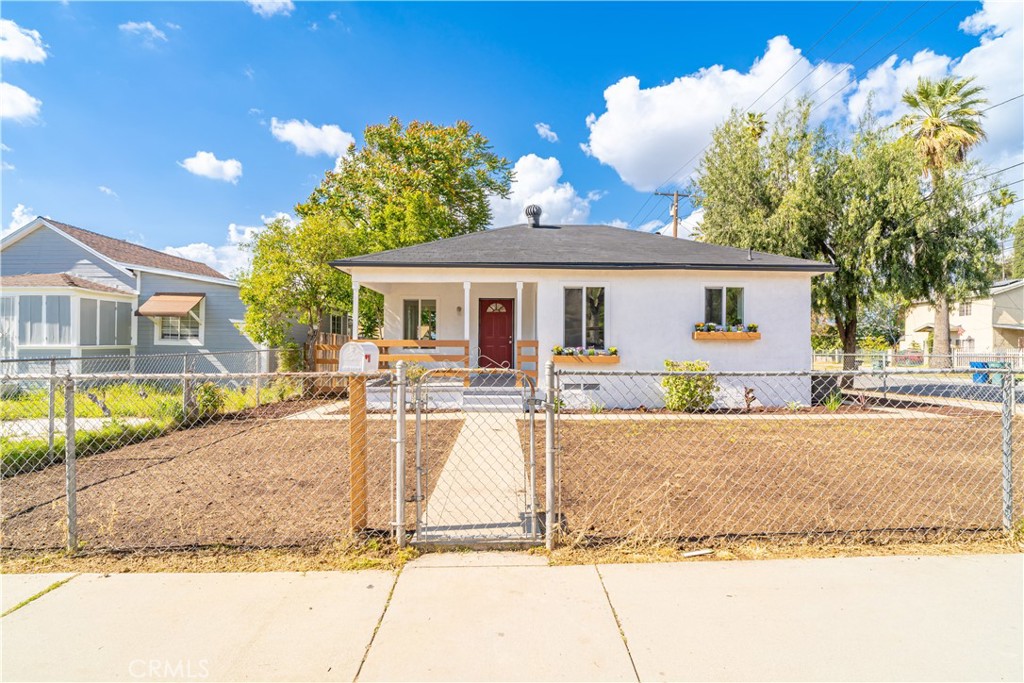 2111 5th Street Riverside, CA 92507 - Photo 1 of 1 a front view of a house with porch
