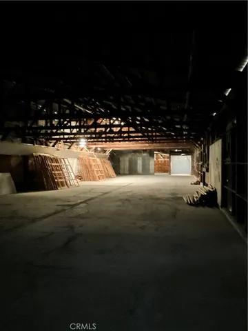 a living room with furniture and a building