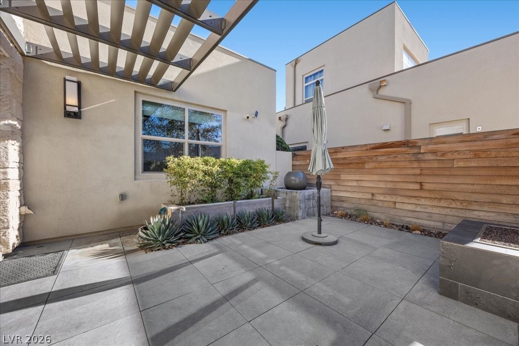 4262 Swift Street Las Vegas, NV 89135 - Photo 7 of 75 View of patio / terrace with a pergola
