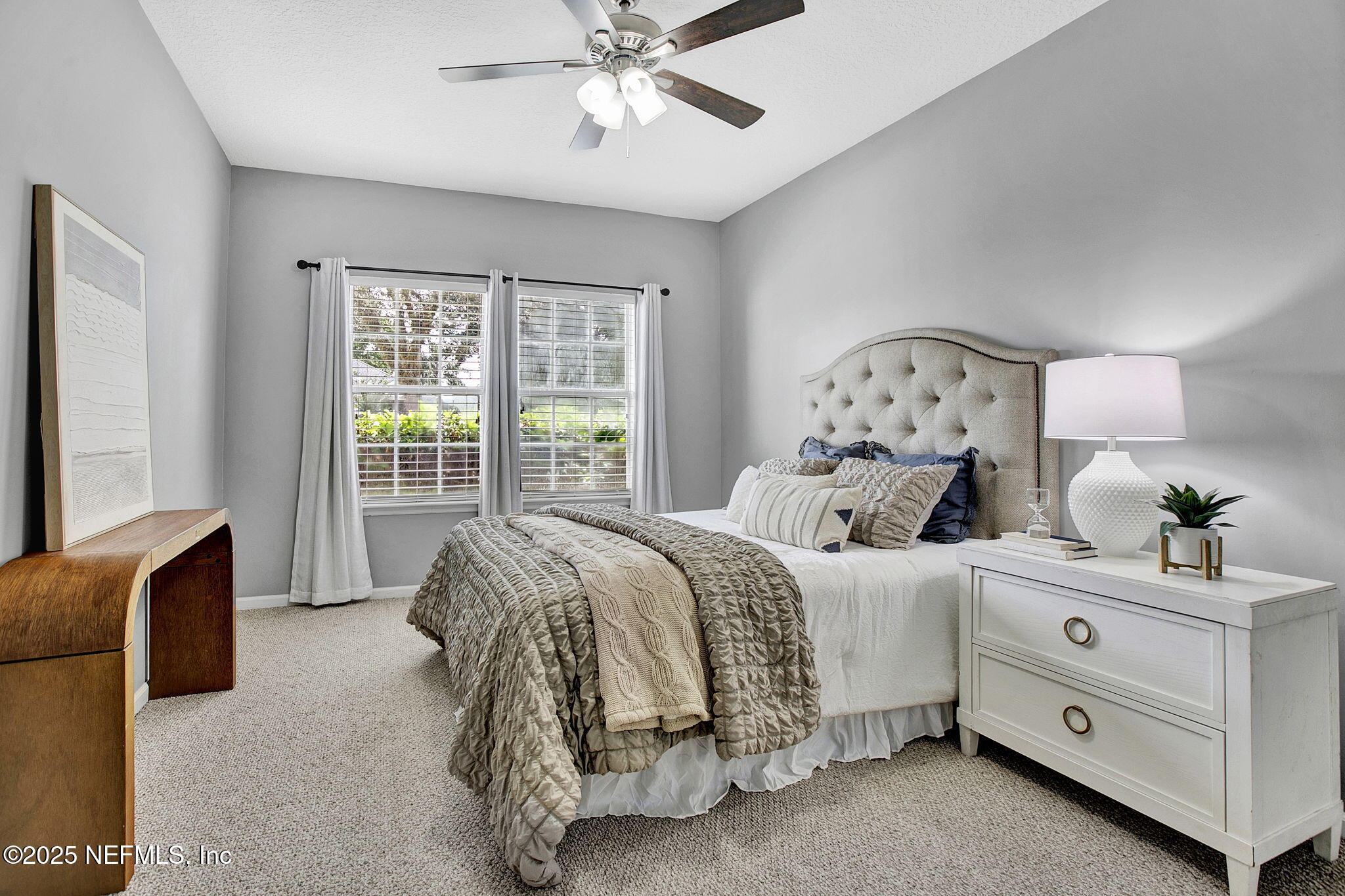 1961 Glenfield Crossing Court St. Augustine, FL 32092 - Photo 14 of 40 a bed room with a bed and a window