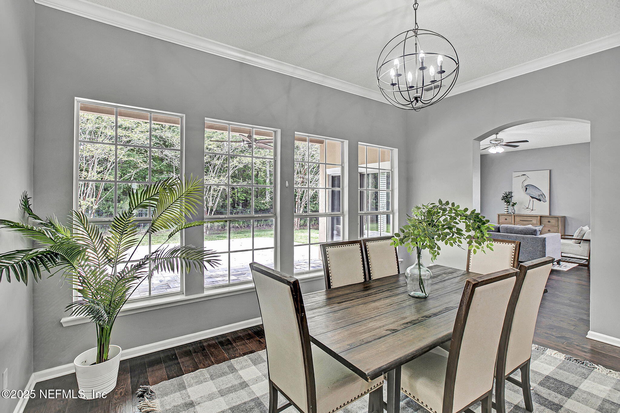 1961 Glenfield Crossing Court St. Augustine, FL 32092 - Photo 17 of 40 a view of a dining room with furniture window and wooden floor