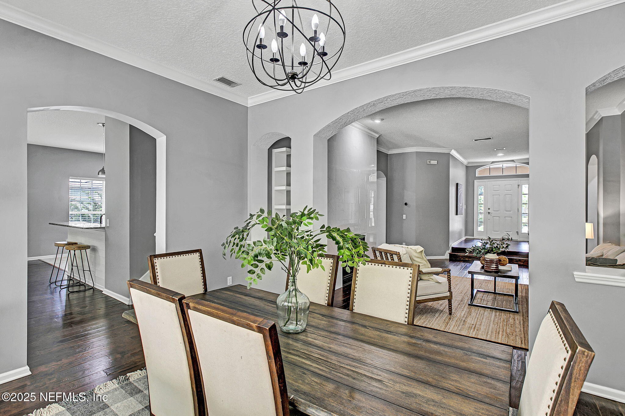 1961 Glenfield Crossing Court St. Augustine, FL 32092 - Photo 18 of 40 a view of a dining room with furniture and wooden floor