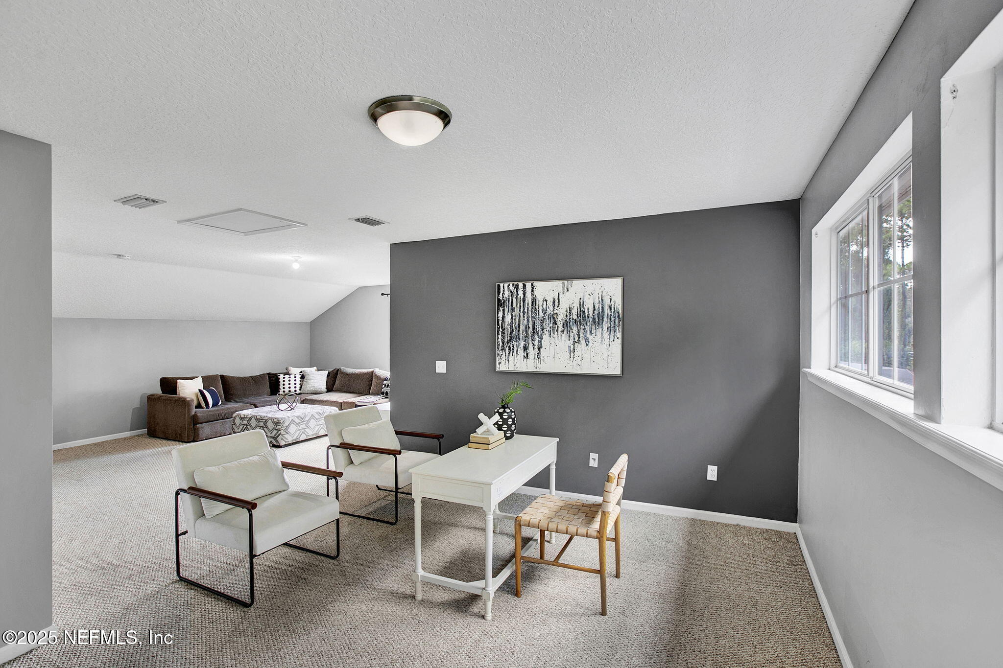 1961 Glenfield Crossing Court St. Augustine, FL 32092 - Photo 23 of 40 a living room with furniture and a window
