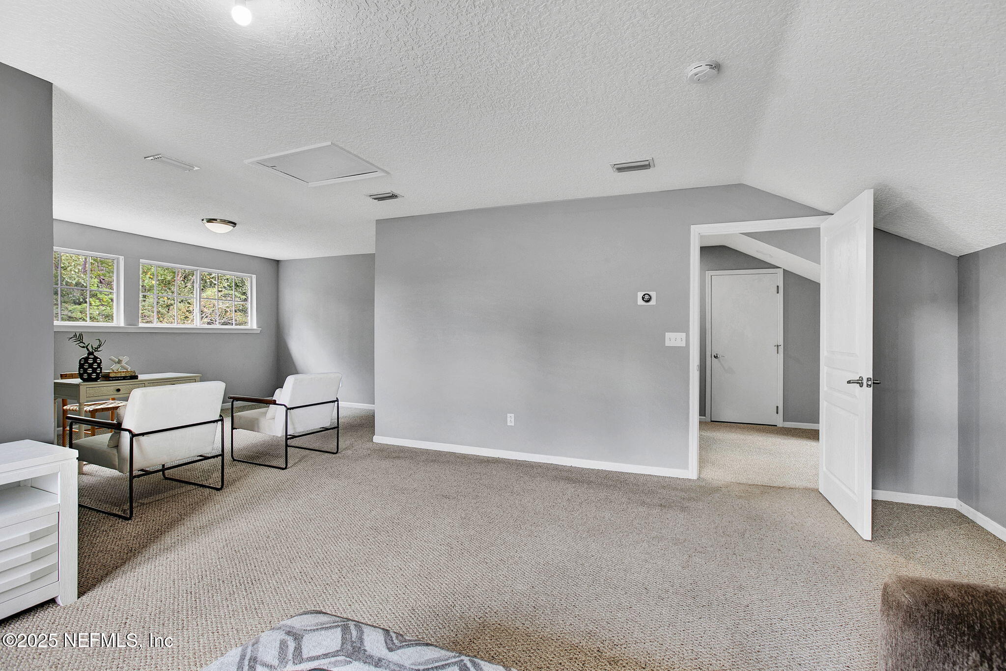 1961 Glenfield Crossing Court St. Augustine, FL 32092 - Photo 24 of 40 a view of livingroom with furniture cabinet and window