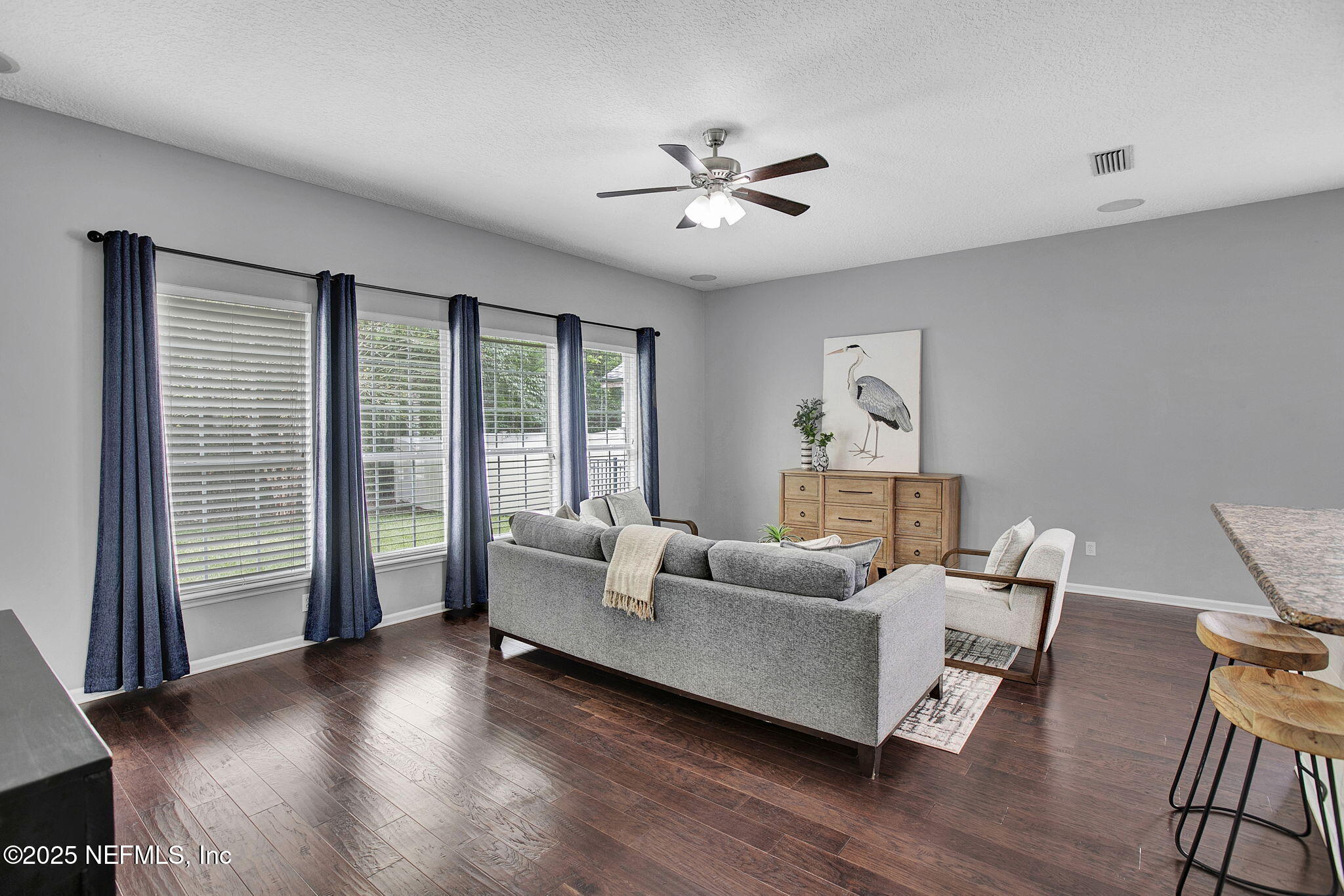1961 Glenfield Crossing Court St. Augustine, FL 32092 - Photo 25 of 40 a living room with furniture and a large window