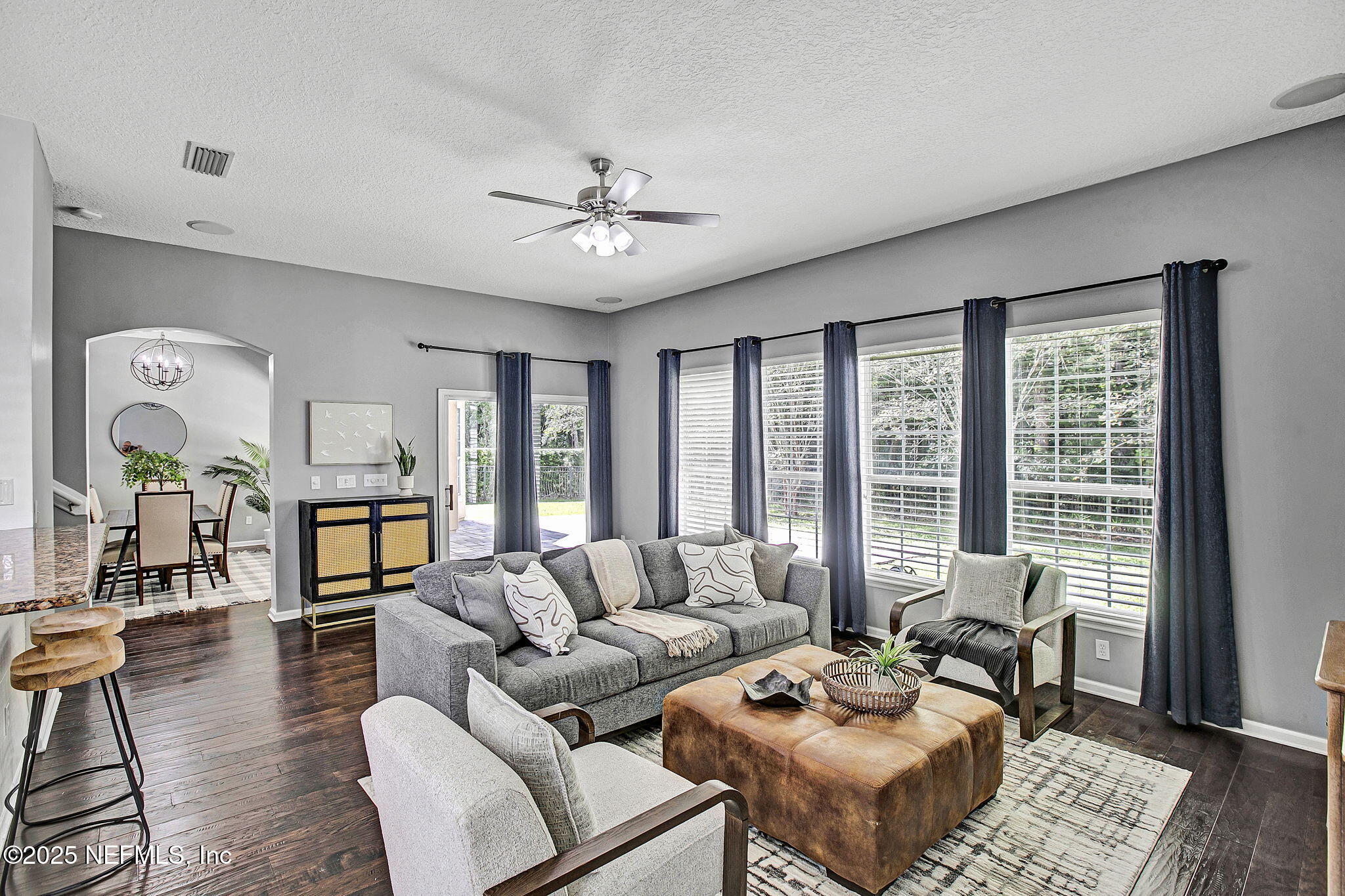1961 Glenfield Crossing Court St. Augustine, FL 32092 - Photo 28 of 40 a living room with furniture and wooden floor