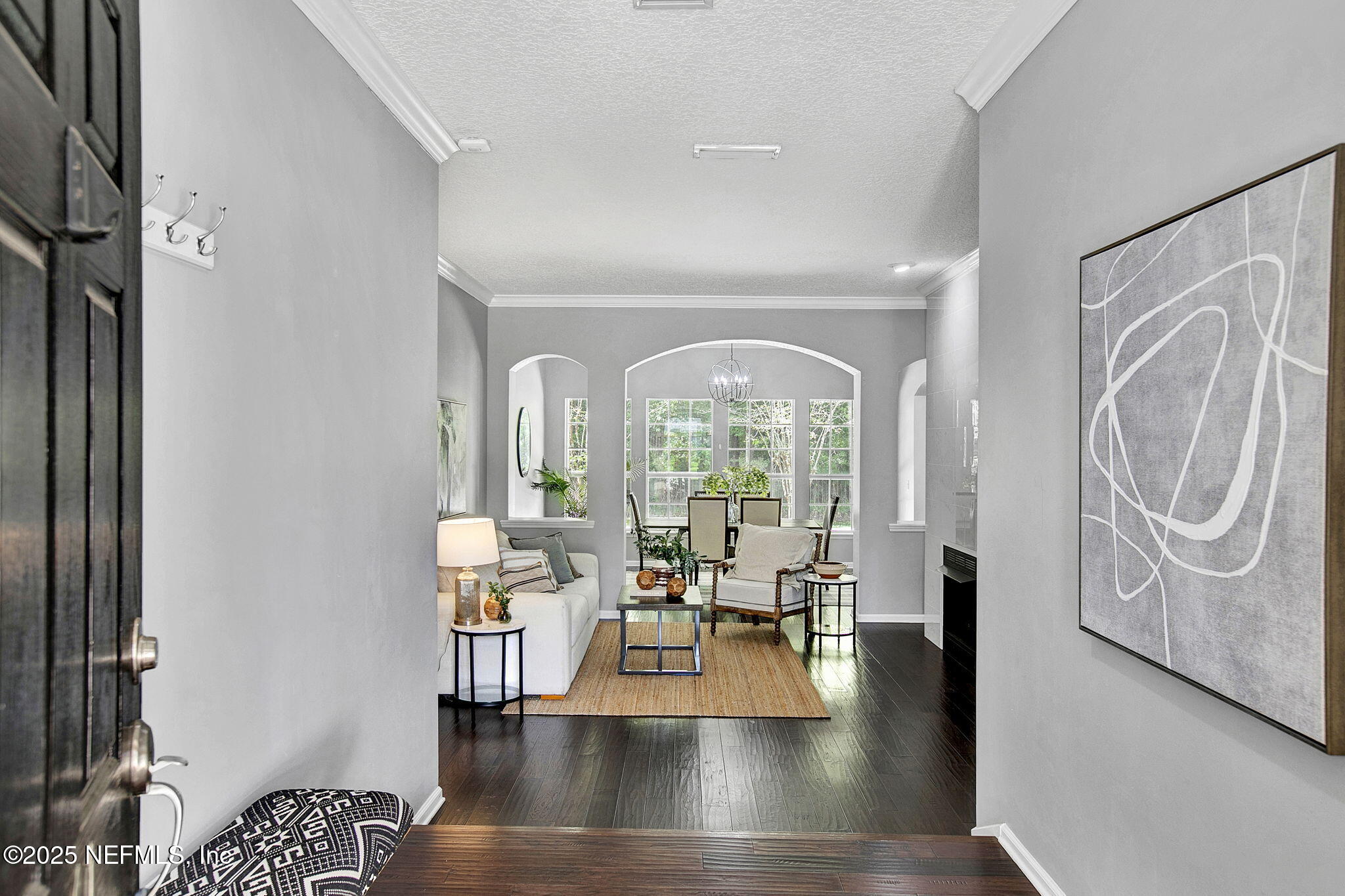 1961 Glenfield Crossing Court St. Augustine, FL 32092 - Photo 3 of 40 a view of living room with furniture and floor to ceiling window