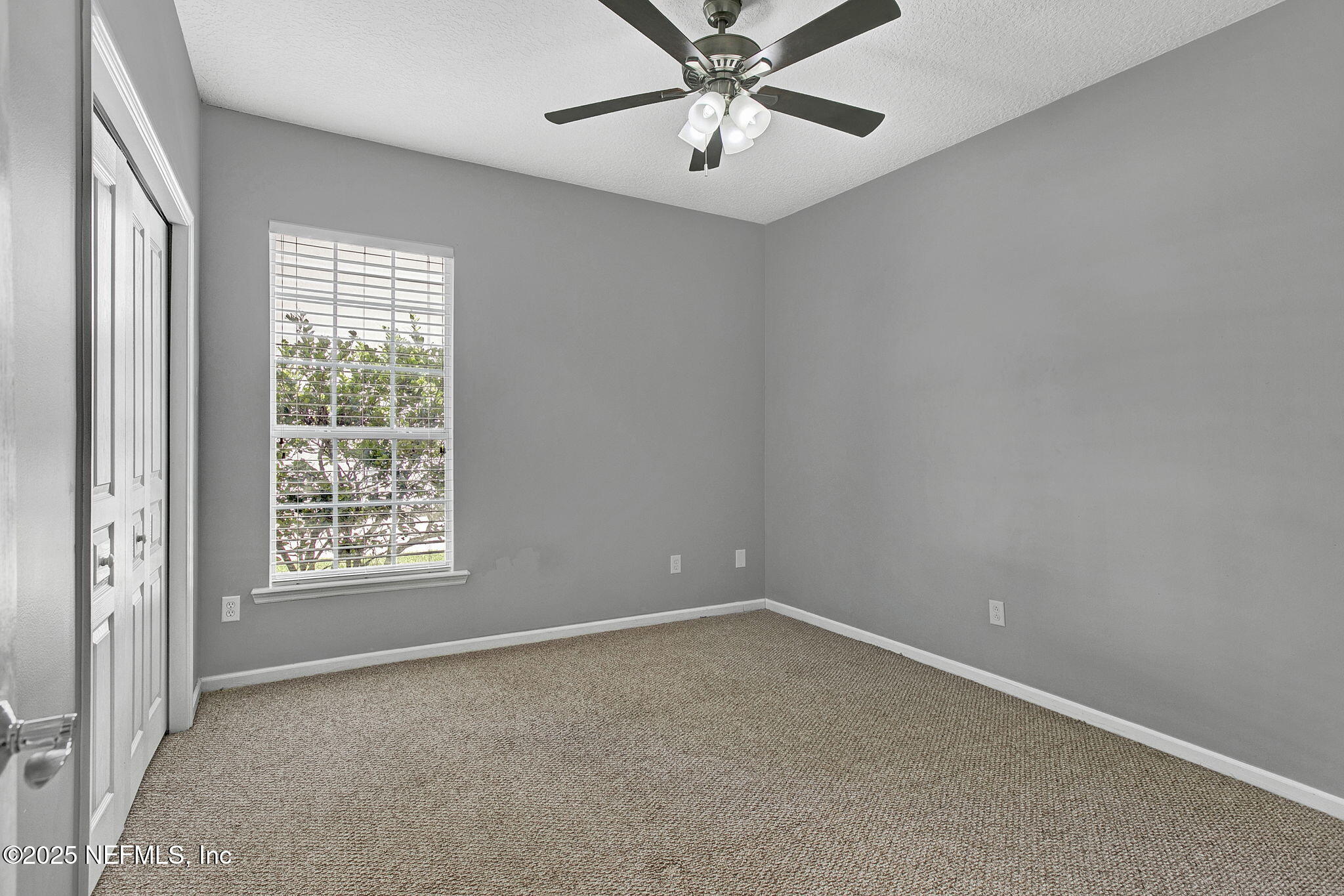 1961 Glenfield Crossing Court St. Augustine, FL 32092 - Photo 33 of 40 a view of an empty room with a window