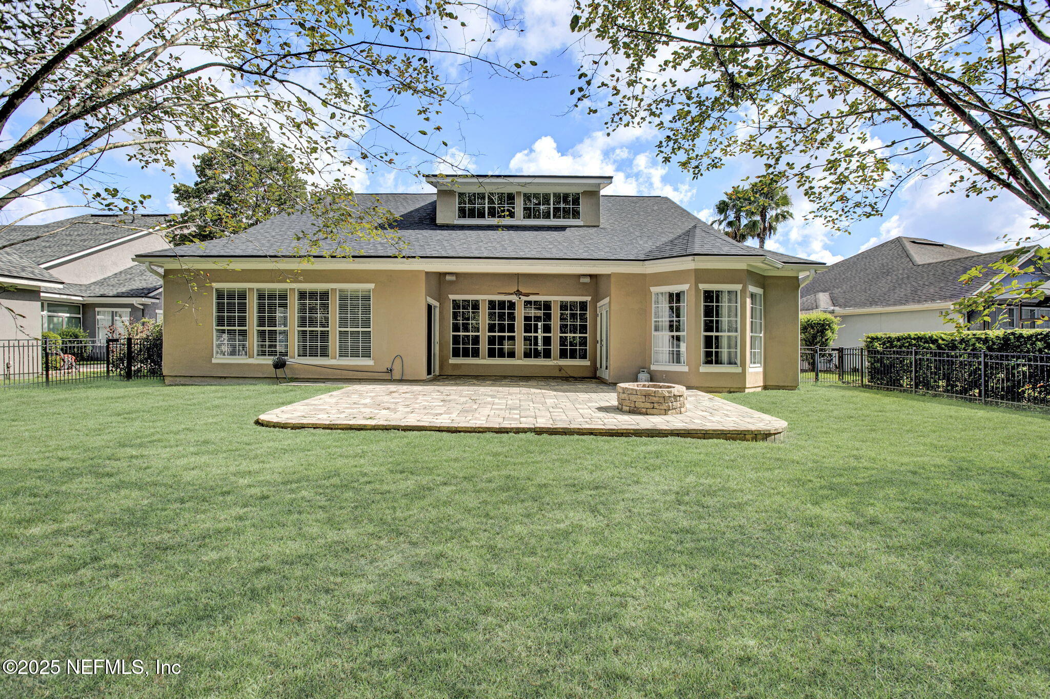 1961 Glenfield Crossing Court St. Augustine, FL 32092 - Photo 38 of 40 a view of house with yard and outdoor seating
