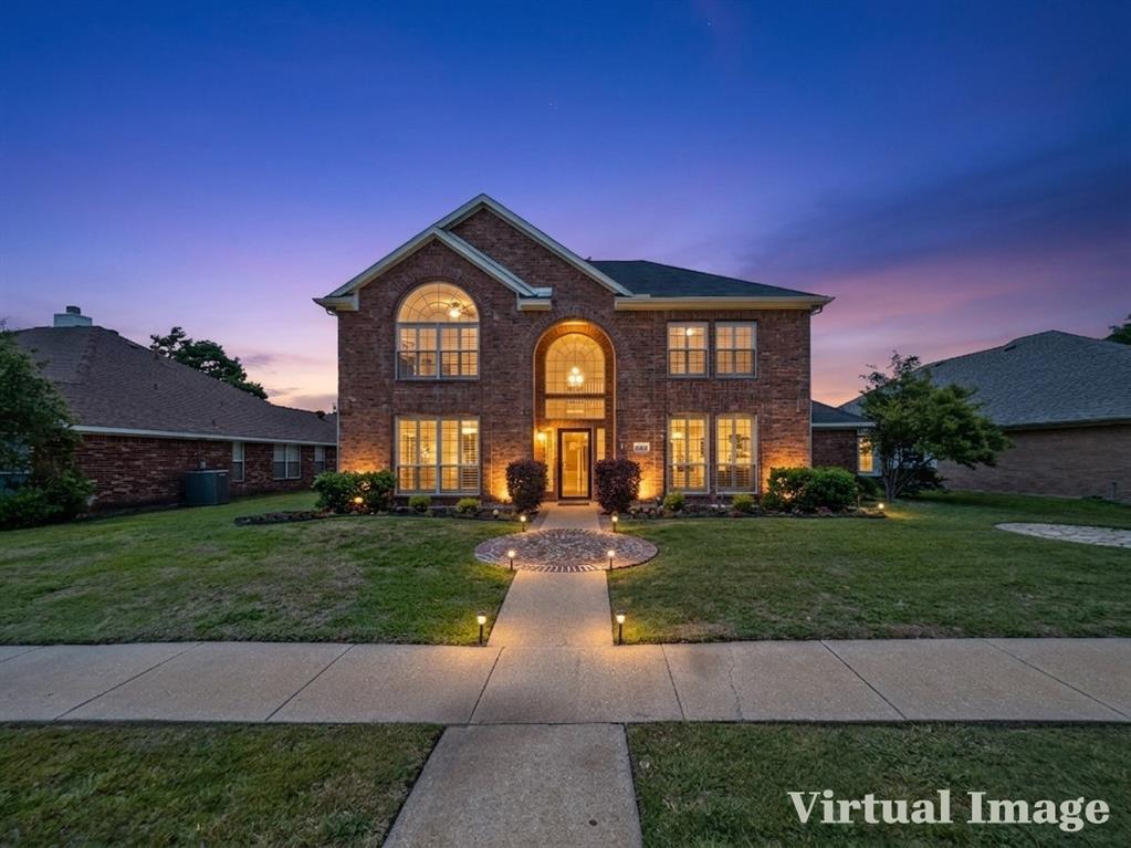 2317 Wellesly Road Rowlett, TX 75089 - Photo 2 of 39 a front view of a house with a yard