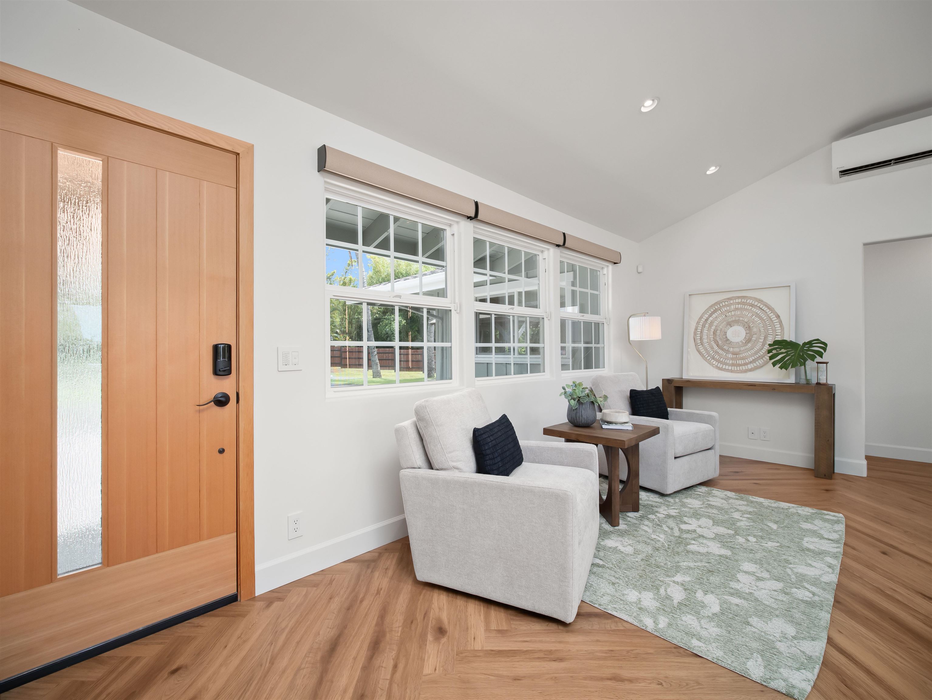 50 Eono Place Haiku, HI 96708 - Photo 9 of 50 a living room with furniture wooden floor and a large window