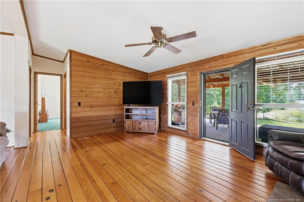 10400 Ruth Vinson Road Autryville, NC 28318 - Photo 24 of 49 a view of a livingroom with furniture wooden floor and window